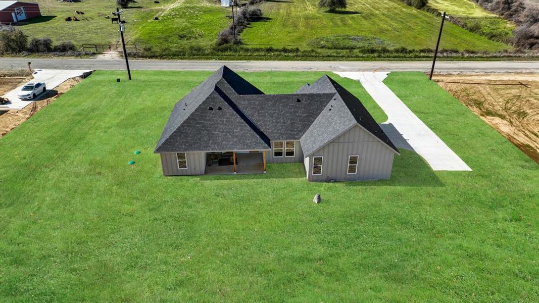 Exterior details and patio area of a home in Parallel Pastures, Poolville (Image 27).