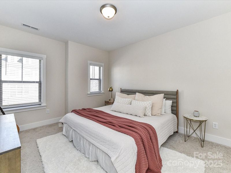 Spacious Secondary Bedroom on upper level with great natural light!