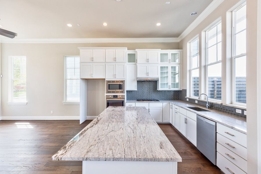 Furnished interior view inside a new home in Concourse at Mueller, Austin (Image 3). Furnished interior view inside a new home in Concourse at Mueller, Austin (Image 3).