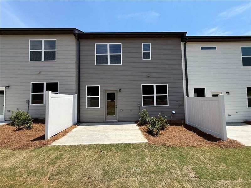 Exterior details and patio area of a home in The Towns at Auburn Station East, Auburn (Image 14).