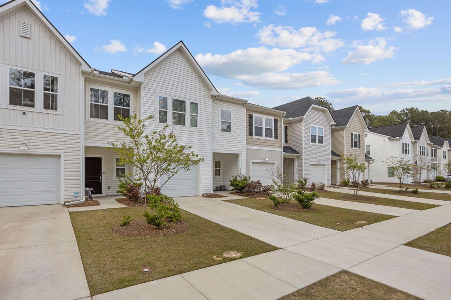 Front exterior of a new home in , North Charleston, SC, highlighting curb appeal (Image 25).