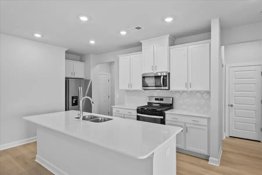 Furnished interior view inside a new home in Creek Ridge - Heritage Collection, Spartanburg (Image 3).