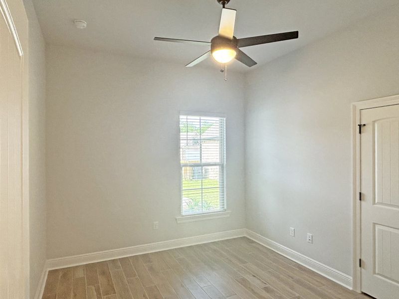 Spacious, unfurnished interior of a new home in Bird Song at Hammock Bay, Freeport (Image 20).