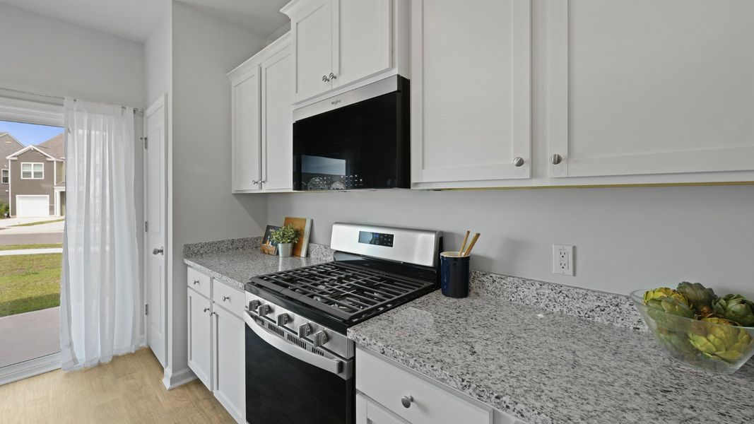 Representative furnished interior of a home built from the DUNCAN by D.R. Horton in Carolina Groves Townhomes, Moncks Corner (Image 6).
