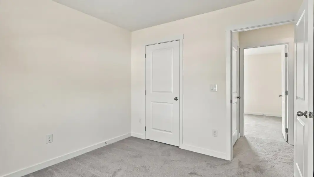 Representative unfurnished interior of a home built from the Glendale by D.R. Horton in Belhaven, Knoxville (Image 39).