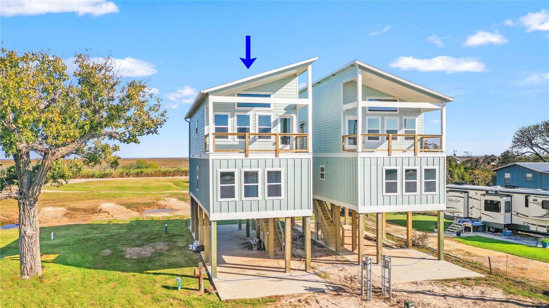 Front exterior of a new home in , Matagorda, TX, highlighting curb appeal (Image 1). Front exterior of a new home in , Matagorda, TX, highlighting curb appeal (Image 1).