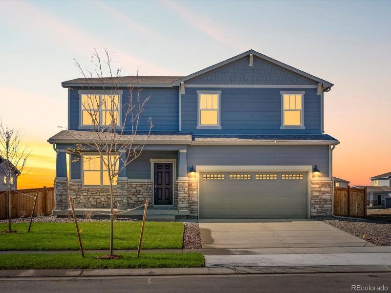 Front exterior of a new home in Buffalo Highlands: The Canyon Collection, Commerce City, CO, highlighting curb appeal (Image 2). Front exterior of a new home in Buffalo Highlands: The Canyon Collection, Commerce City, CO, highlighting curb appeal (Image 2).