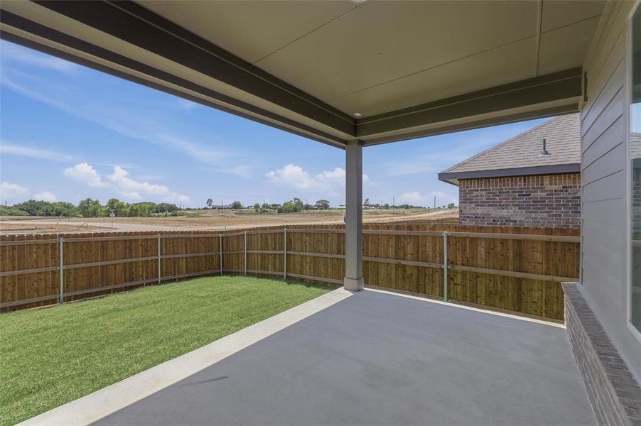 Covered patio featuring a concrete surface, a ceiling fan, and recessed lighting