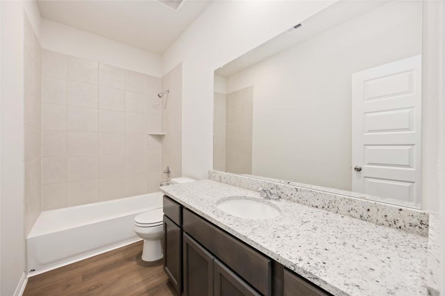 Furnished interior view inside a new home in Meadow Park, Conroe (Image 10).
