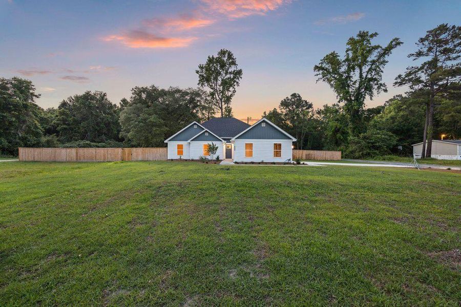Exterior details and patio area of a home in , Awendaw (Image 4).