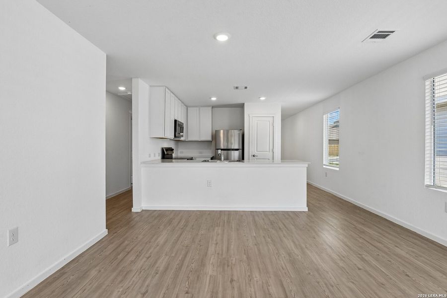 Furnished interior view inside a new home in Valle Sol, Von Ormy (Image 6).