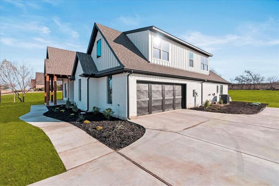 Front exterior of a new home in , Godley, TX, highlighting curb appeal (Image 26).