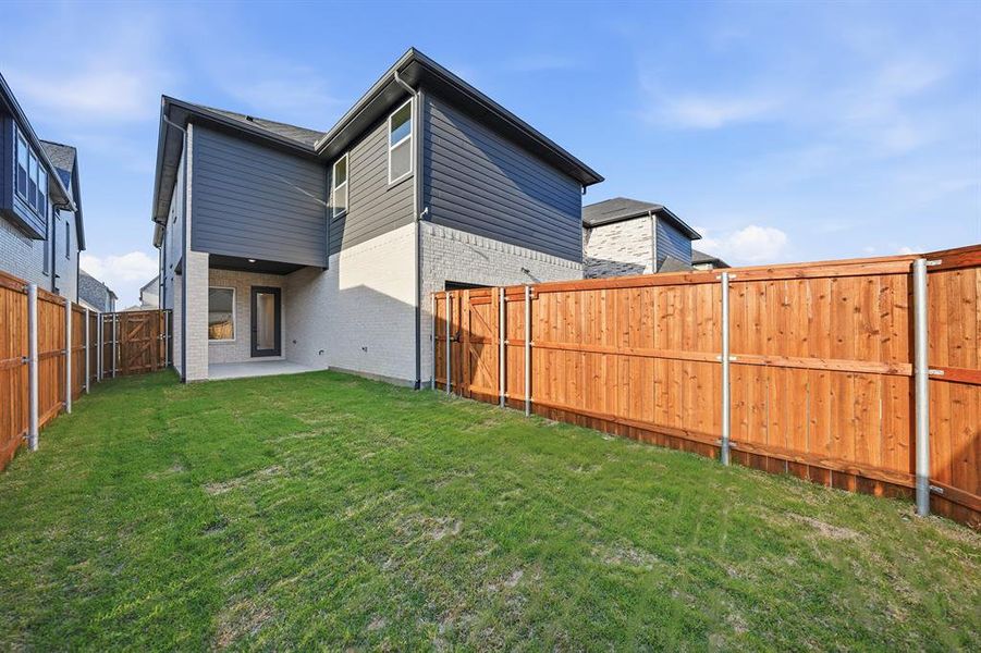 Exterior details and patio area of a home in Light Farms Brenham - 40' Lots, Celina (Image 4). Exterior details and patio area of a home in Light Farms Brenham - 40' Lots, Celina (Image 4).