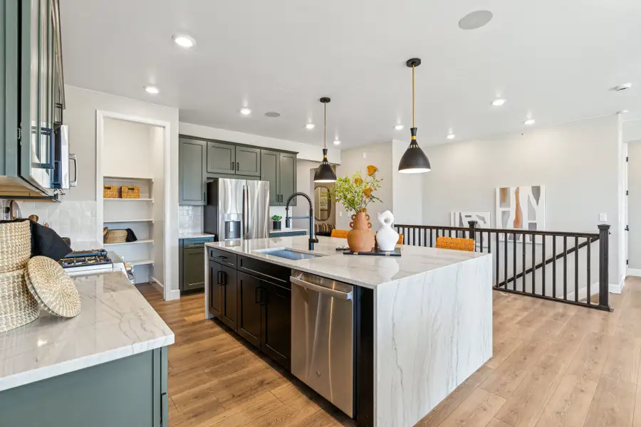 Furnished interior view inside a new home in Trailstone, Arvada (Image 13).