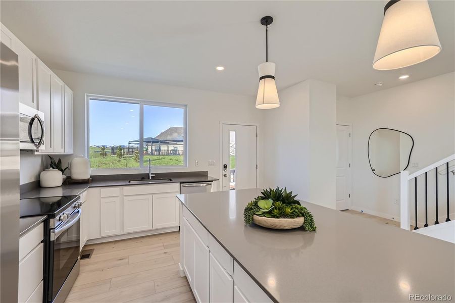 Furnished interior view inside a new home in , Arvada (Image 8).