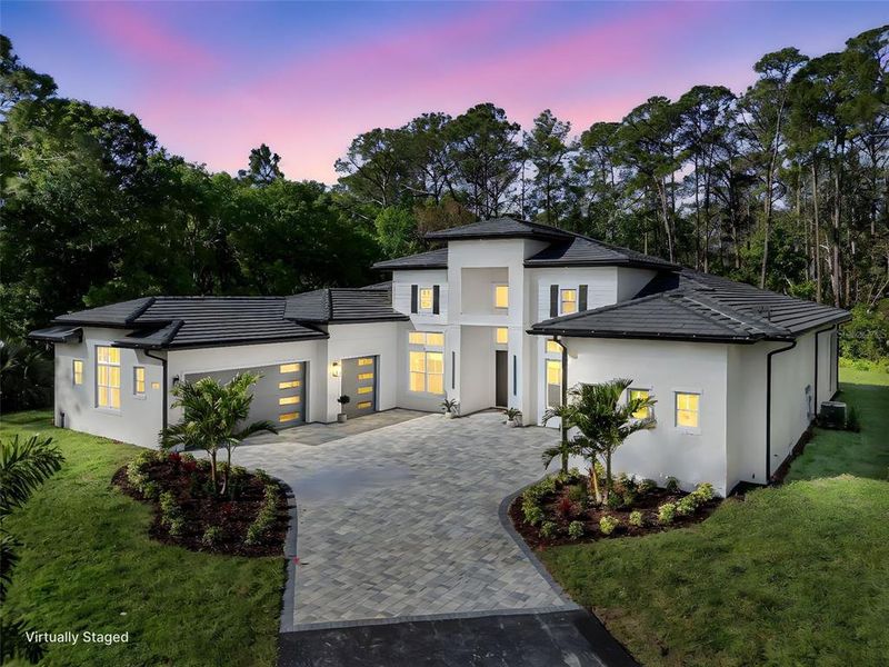 Front exterior of a new home in , Kissimmee, FL, highlighting curb appeal (Image 2). Front exterior of a new home in , Kissimmee, FL, highlighting curb appeal (Image 2).