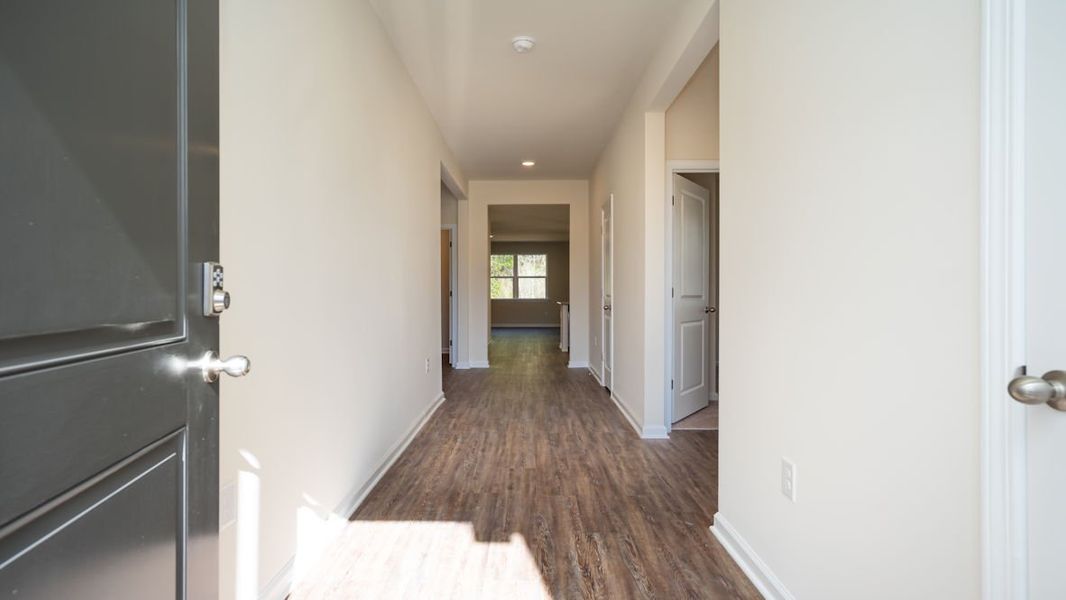Representative unfurnished interior of a home built from the CALI by D.R. Horton in The Reserve at Wild Horse, Conway (Image 11).