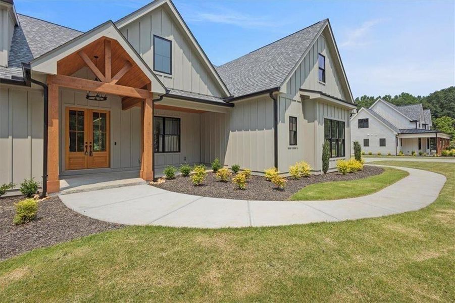 Front exterior of a new home in , Gainesville, GA, highlighting curb appeal (Image 29). Front exterior of a new home in , Gainesville, GA, highlighting curb appeal (Image 29).