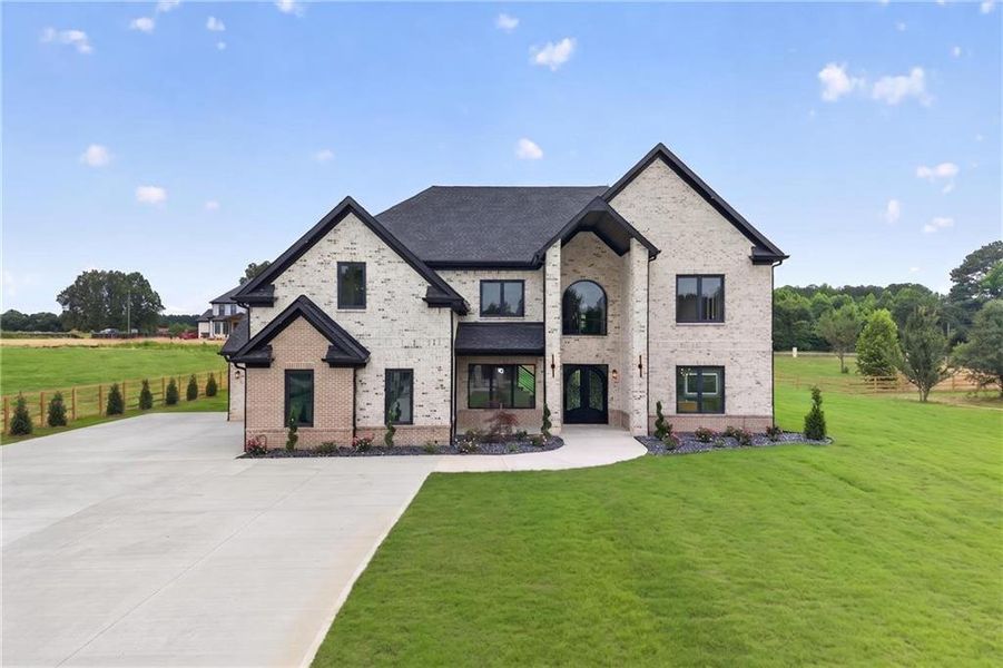 Front exterior of a new home in , Dacula, GA, highlighting curb appeal (Image 26). Front exterior of a new home in , Dacula, GA, highlighting curb appeal (Image 26).