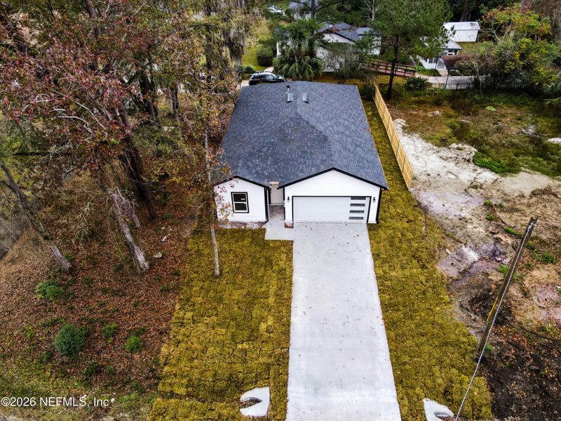 Front exterior of a new home in , Jacksonville, FL, highlighting curb appeal (Image 24).