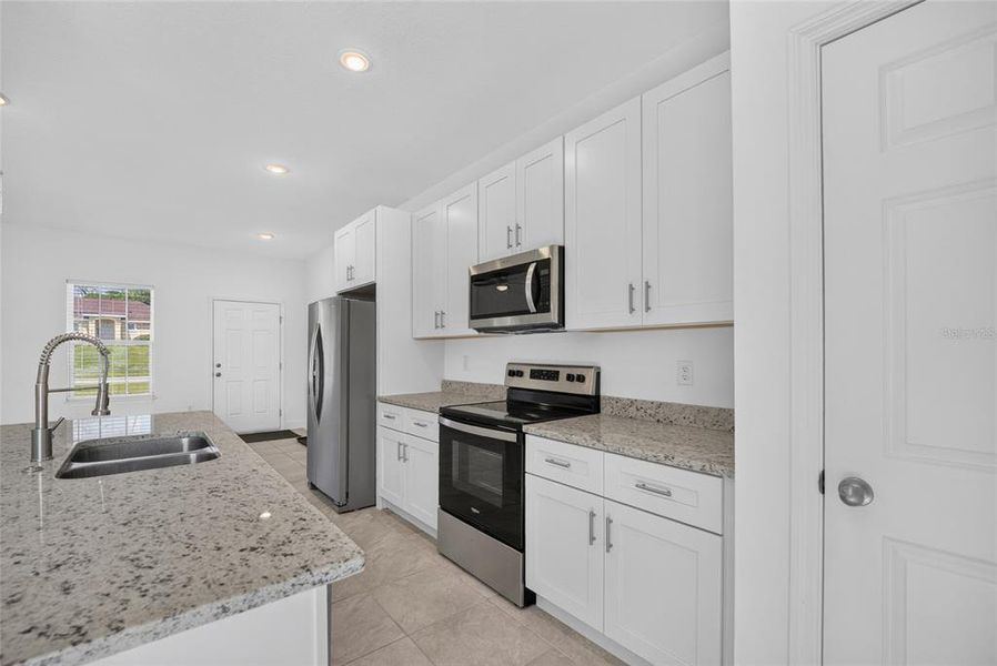 Furnished interior view inside a new home in , Ocala (Image 8).