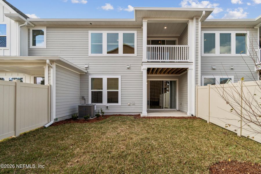 Exterior details and patio area of a home in Kettering at eTown - Traditional Collection, Jacksonville (Image 3).