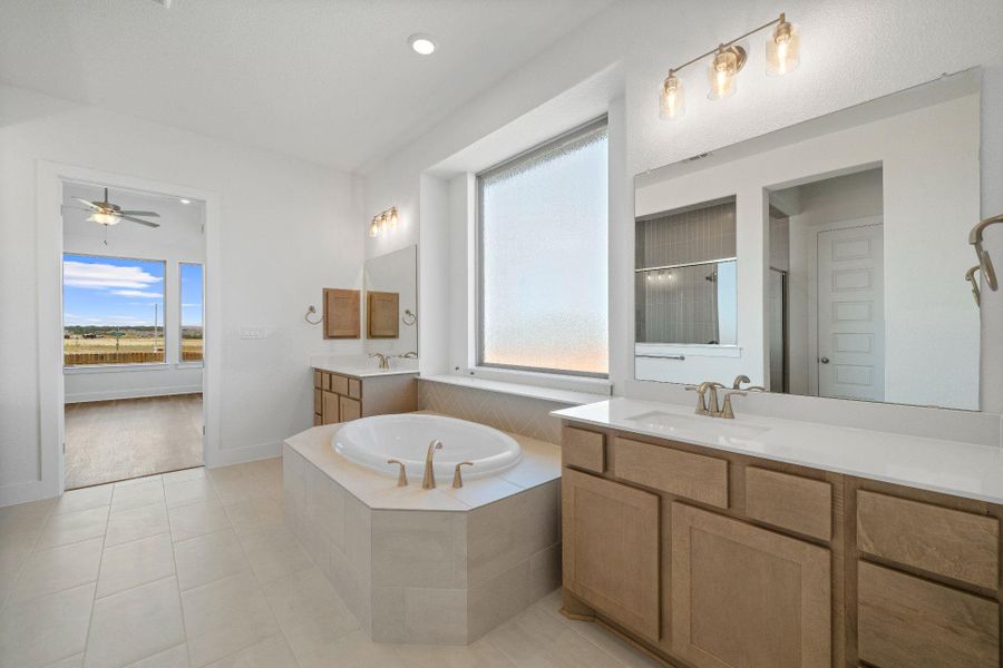 Primary Bath retreat with dual vanities & garden tub Primary Bath retreat with dual vanities & garden tub