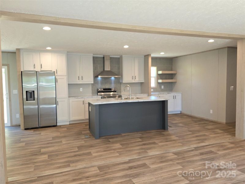 Living space opens into kitchen. Living space opens into kitchen.