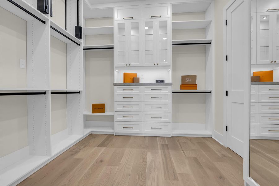 Professionally designed and installed closet with its own laundry