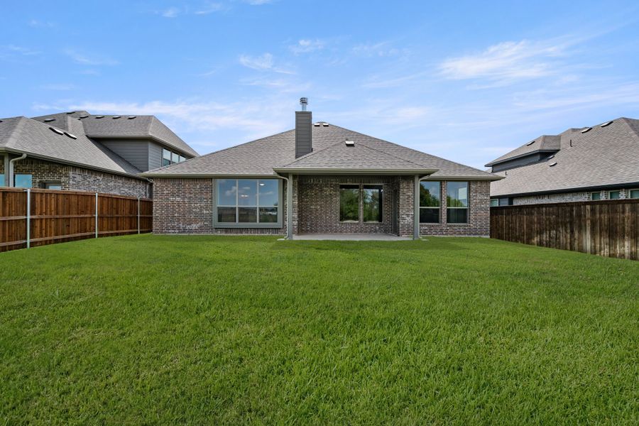 Exterior details and patio area of a home in Silo Mills, Joshua (Image 4).