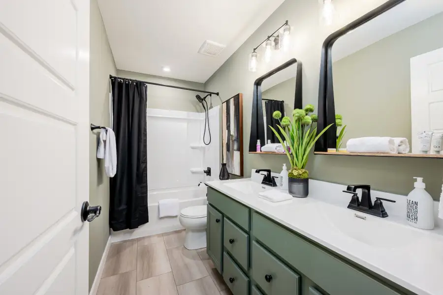 Representative furnished interior of a home built from the Grandin by Fischer Homes in The Dunes at Sandbar, Santa Rosa Beach (Image 45).