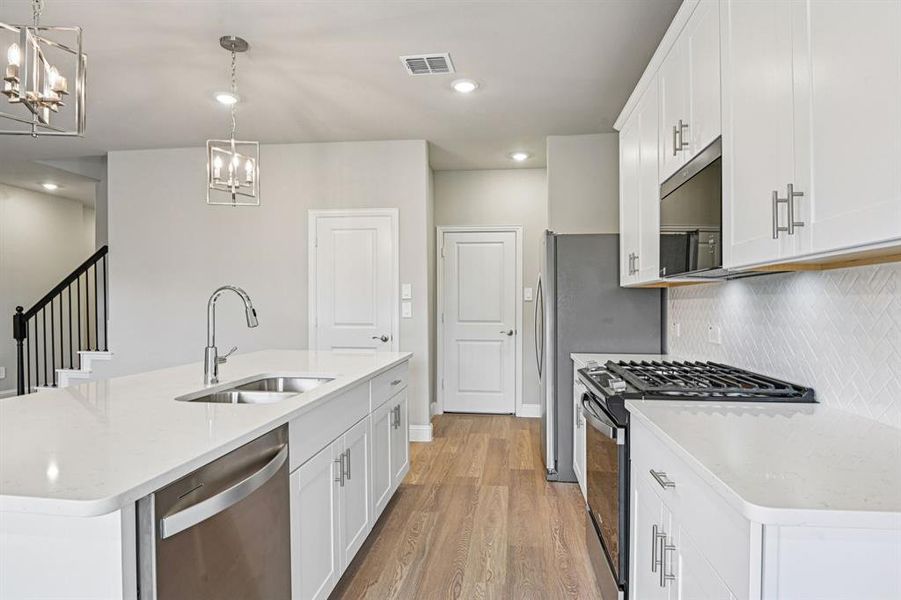 Furnished interior view inside a new home in Parks at Foster Crossing - Signature Series, Anna (Image 8).