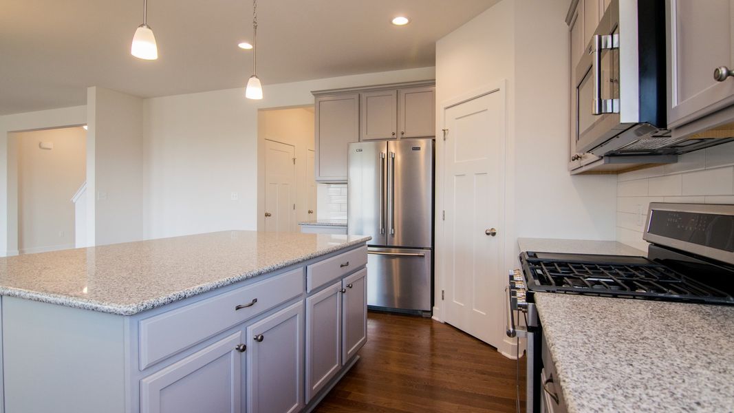 Representative furnished interior of a home built from the The Hartland by Norfolk Homes in Coronado Estates, Jackson (Image 40).