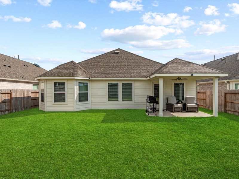 Exterior details and patio area of a home in Marvida, Cypress (Image 4).