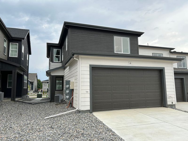 Front exterior of a new home in Westside Crossing, Berthoud, CO, highlighting curb appeal (Image 5).
