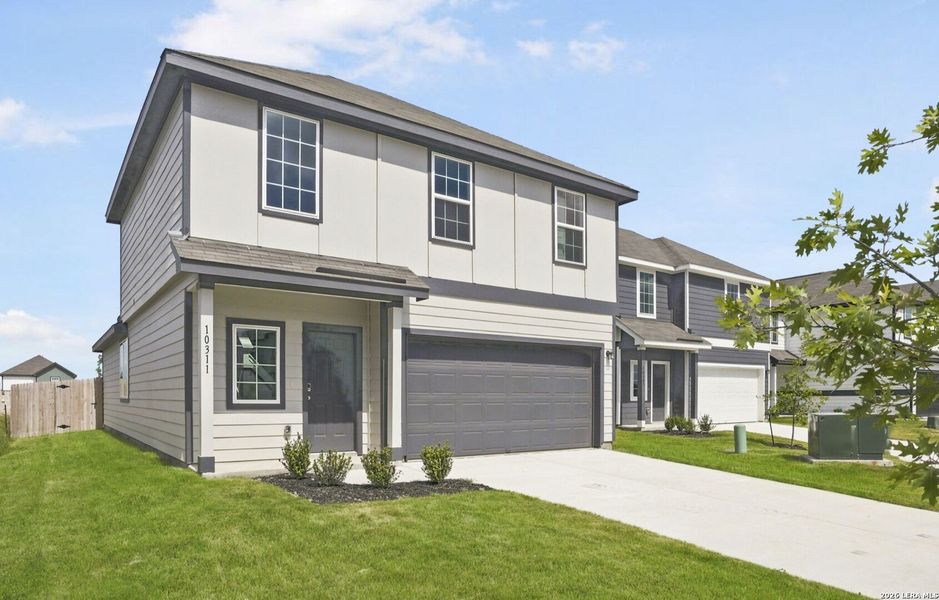 Front exterior of a new home in Applewhite Meadows, San Antonio, TX, highlighting curb appeal (Image 2). Front exterior of a new home in Applewhite Meadows, San Antonio, TX, highlighting curb appeal (Image 2).