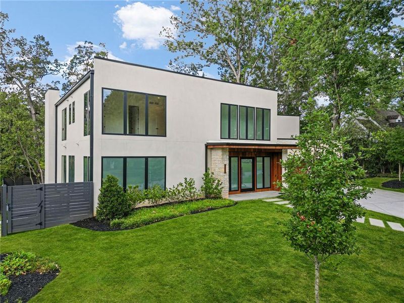 Front exterior of a new home in , Atlanta, GA, highlighting curb appeal (Image 32).
