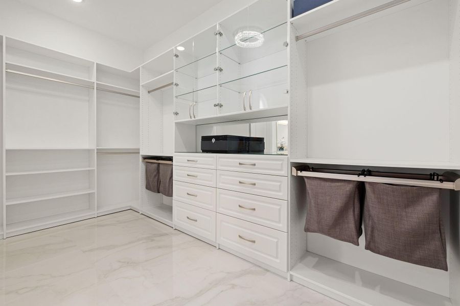 Walk-in closet offering generous storage and a clean, organized layout.
