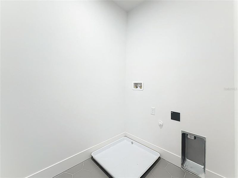 Laundry room with washer and dryer hookups, located on the 2nd floor. Laundry room with washer and dryer hookups, located on the 2nd floor.