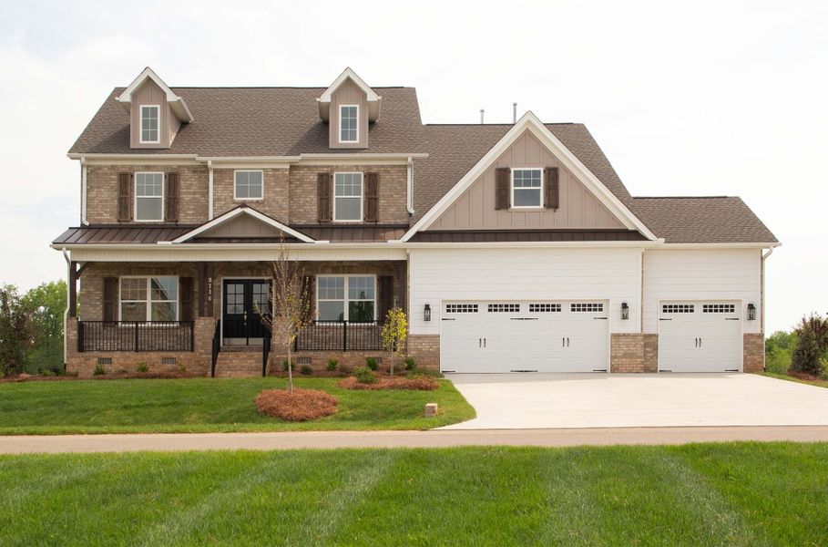 Front exterior of a new home in Blacksmith, Stokesdale, NC, highlighting curb appeal (Image 1). Front exterior of a new home in Blacksmith, Stokesdale, NC, highlighting curb appeal (Image 1).
