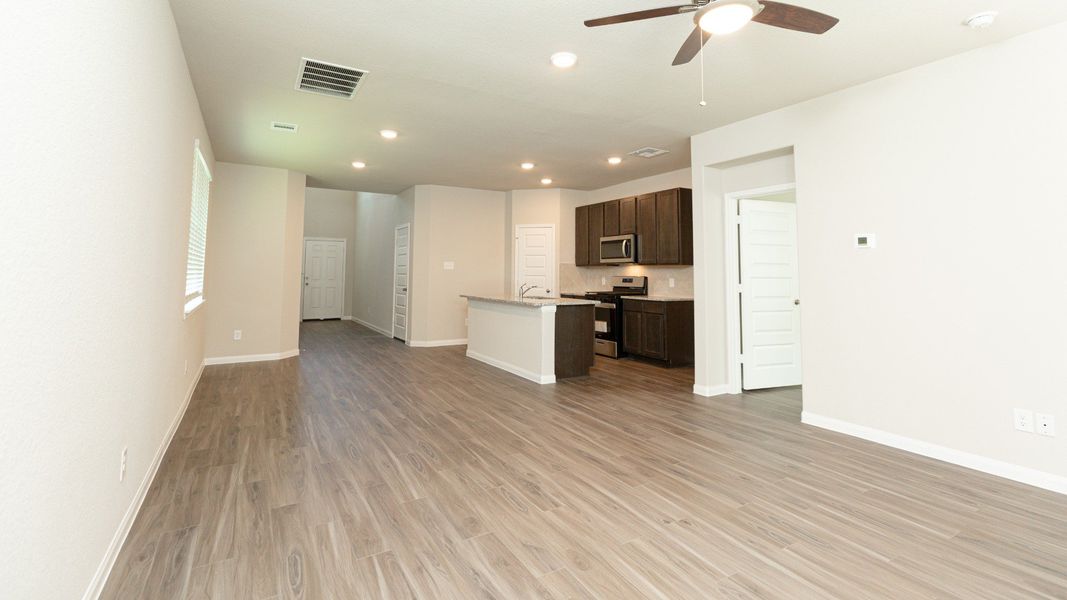 Family Room to Dining Area and Kitchen