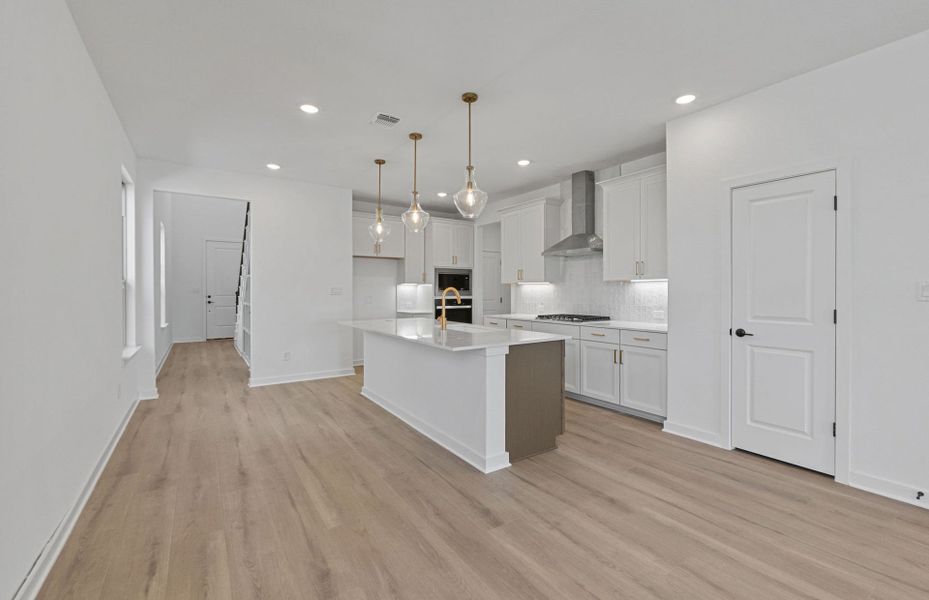 Furnished interior view inside a new home in Wolf Ranch, Georgetown (Image 7).