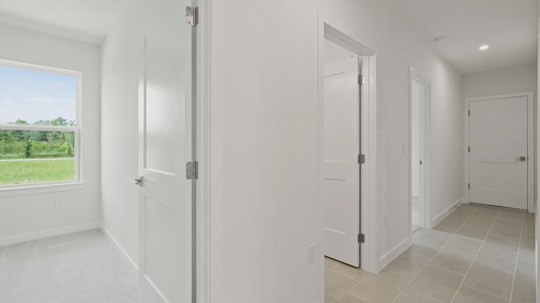 Furnished interior view inside a new home in Grasslands West, Lakeland (Image 24).