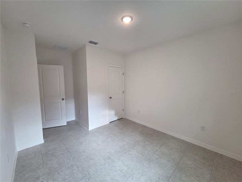 Spacious, unfurnished interior of a new home in Hammock Reserve, Haines City (Image 14). Spacious, unfurnished interior of a new home in Hammock Reserve, Haines City (Image 14).