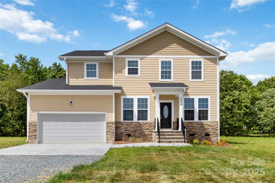 Front exterior of a new home in , Monroe, NC, highlighting curb appeal (Image 2).