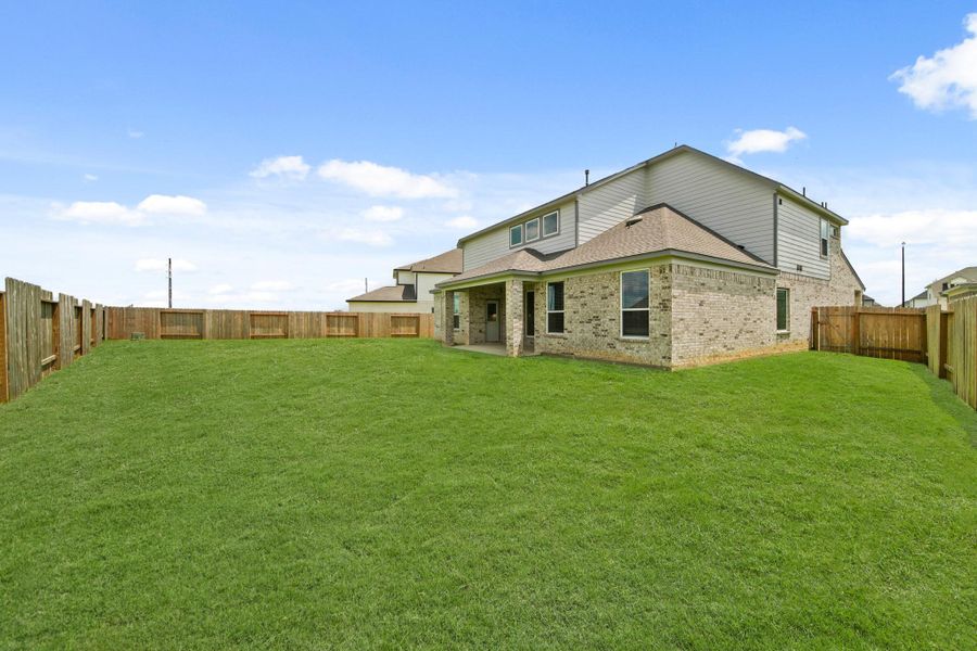 Front exterior of a new home in Beacon Hill, Waller, TX, highlighting curb appeal (Image 1). Front exterior of a new home in Beacon Hill, Waller, TX, highlighting curb appeal (Image 1).