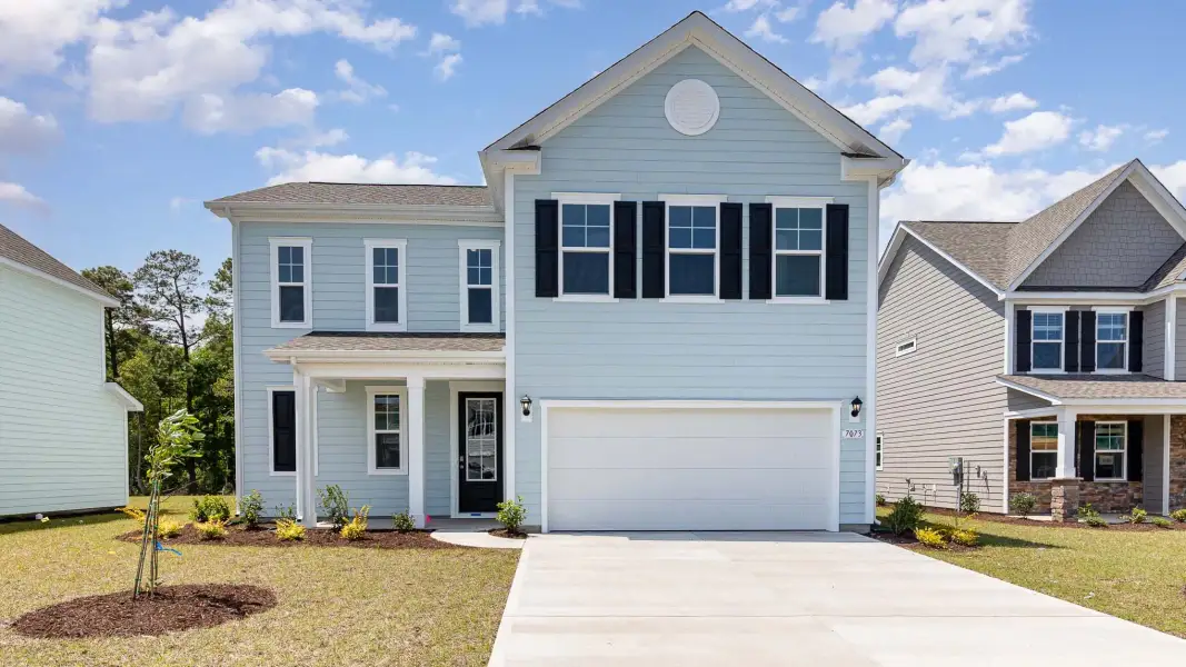 Representative exterior photo of a completed home built from the Belfort by D.R. Horton in Riverlake, Supply, NC (Image 24).