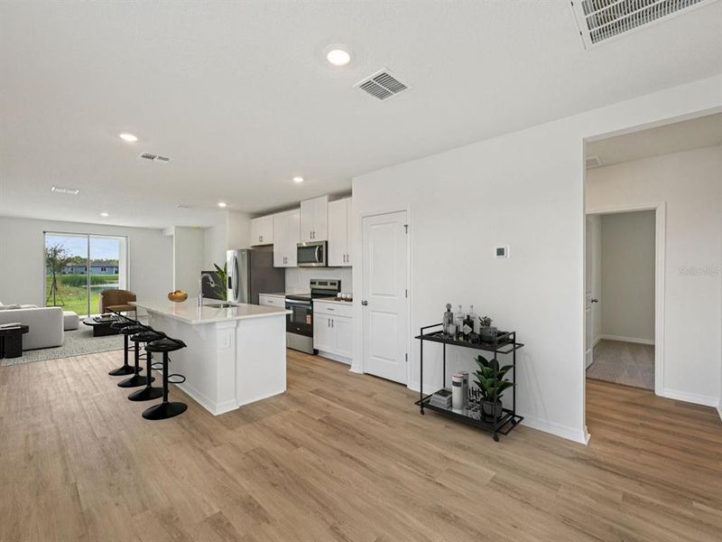 Furnished interior view inside a new home in Coasterra - Premier Series, Palmetto (Image 10).