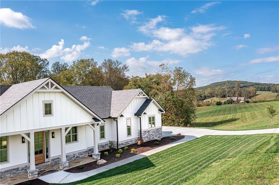 Front exterior of a new home in , Blairsville, GA, highlighting curb appeal (Image 35).