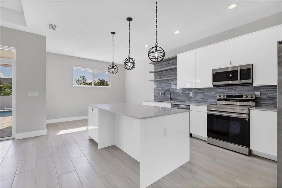 Furnished interior view inside a new home in , Port Charlotte (Image 10). Furnished interior view inside a new home in , Port Charlotte (Image 10).